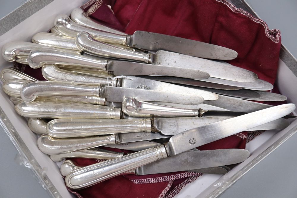 A matched set of twelve 19th century silver thread pattern table knives and a set of twelve pistol handles dessert knives.